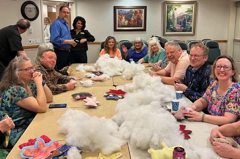 Stuffing bears at the dance service project.